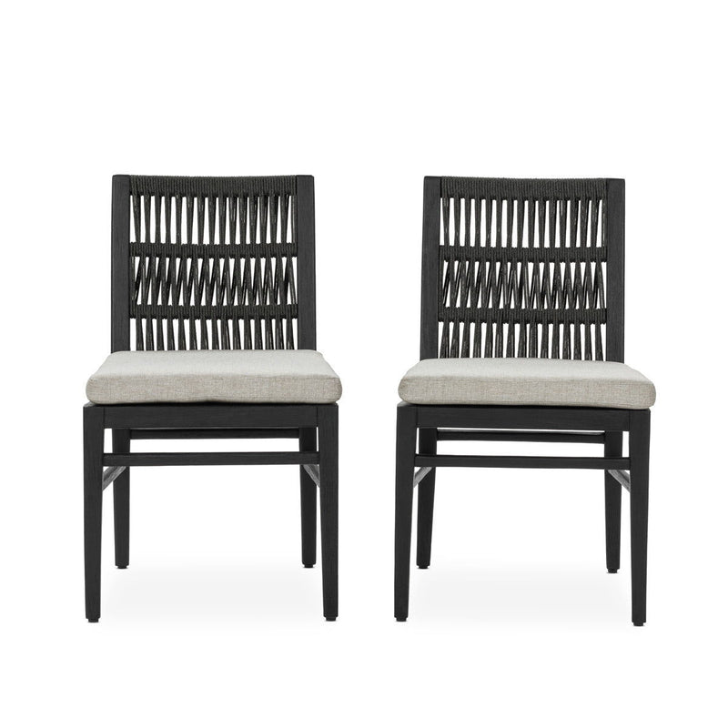 Set of 2 black outdoor dining chairs with slatted backs and beige seat cushions
