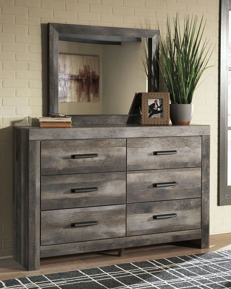 Gray dresser with six drawers and rectangular wall mirror above