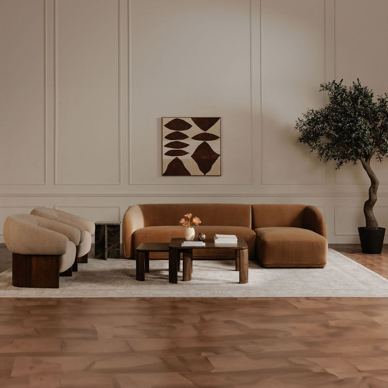 Framed abstract wall art with beige background and dark brown overlapping shapes