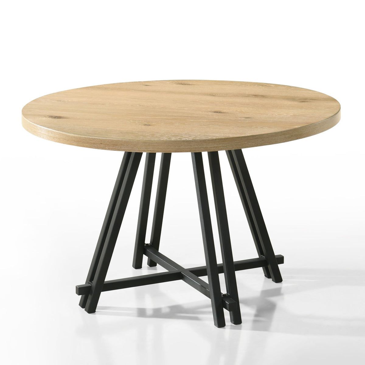 Round oak dining table with black cross-legged base and light wood grain top