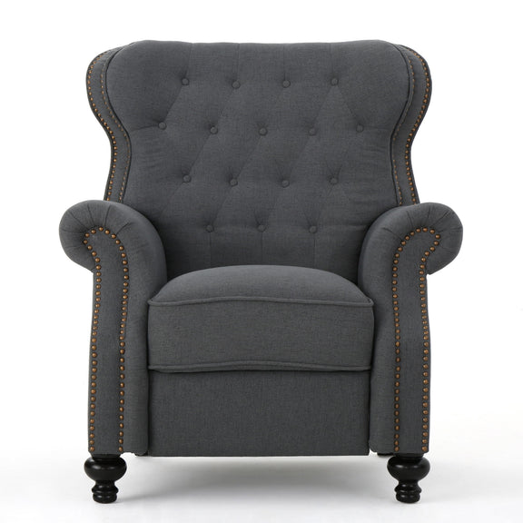 Dark gray tufted recliner chair with studded trim, rounded arms, and dark ball feet.
