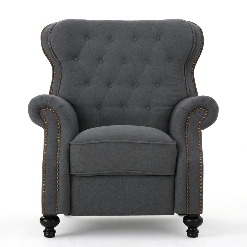 Dark gray tufted recliner chair with studded trim, rounded arms, and dark ball feet.