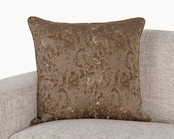 Textured throw pillow with mottled dark bronze pattern and piped edges, front view