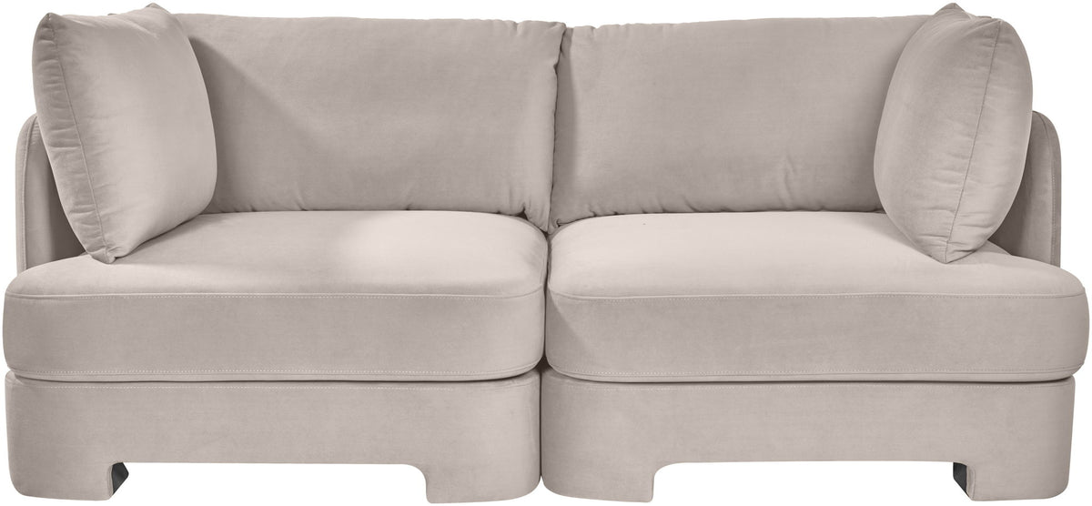 Pale gray velvet upholstered loveseat with rounded arms and two back cushions