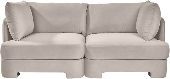 Pale gray velvet upholstered loveseat with rounded arms and two back cushions