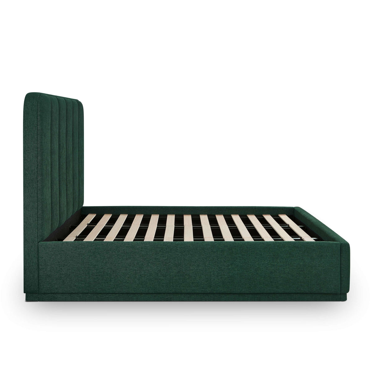 Dark green upholstered bed with slatted base and tall headboard in arched silhouette.