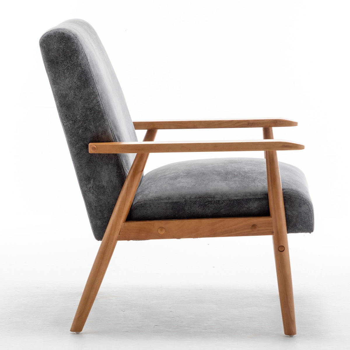 Wide mid-century modern arm chair with dark gray padded upholstery and light wood arms