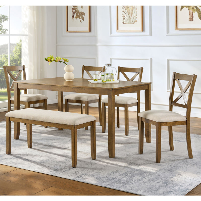 Dining table set with upholstered bench and four cross-back chairs around rectangular table.