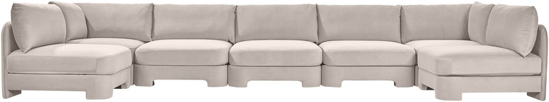 Light gray velvet U-shaped armless sectional sofa with tufted cushions