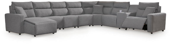 Salt-and-pepper gray fabric modular sectional with multiple seats and chaise sections, low legs