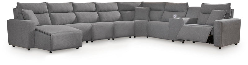 Salt-and-pepper gray fabric modular sectional with multiple seats and chaise sections, low legs