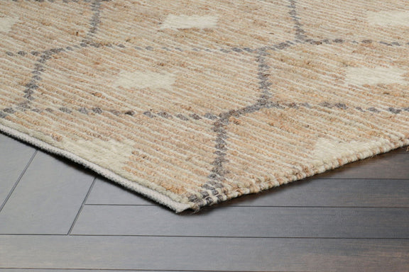 Natural-tone rug corner with diamond pattern and short woven texture.