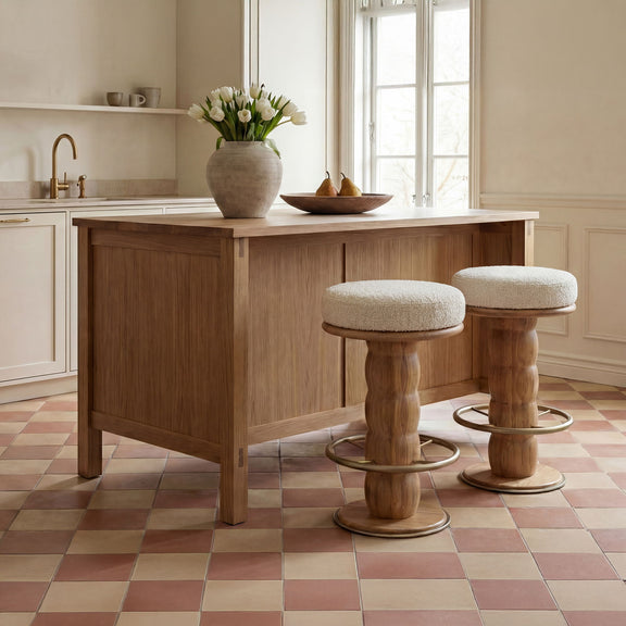 Set of 3 swivel counter stools with light brown wood bases and cushioned round seats