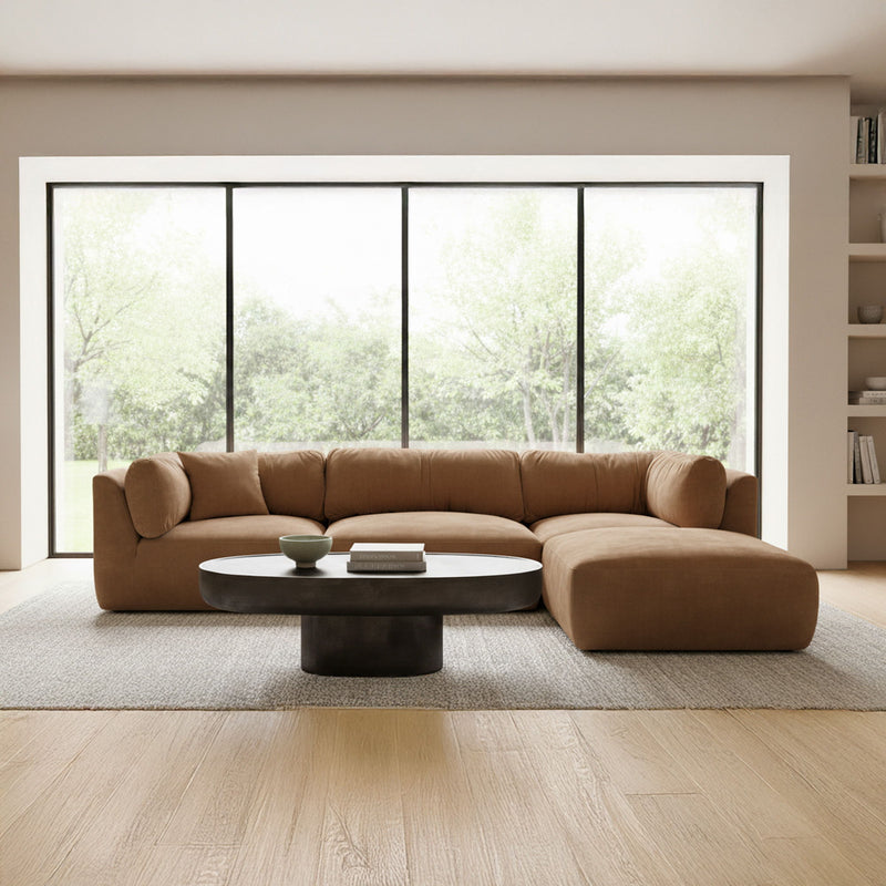 Taupe modular sectional sofa with chaise, curved arms and soft cushioned seats