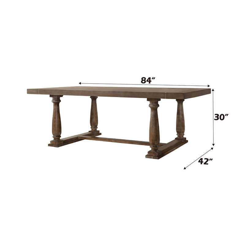 Dark brown rectangular dining table with four pedestal legs and apron