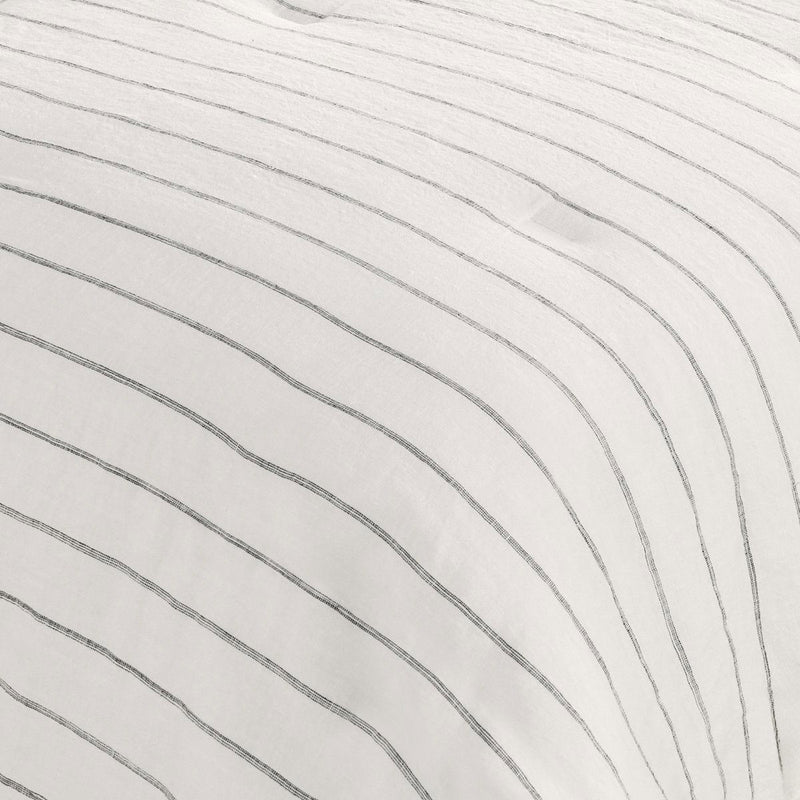 Ivory fabric with gray wavy vertical stripe quilting texture