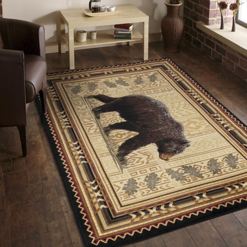 Rectangular rug with black bear silhouette centerpiece, cream medallion design and geometric border