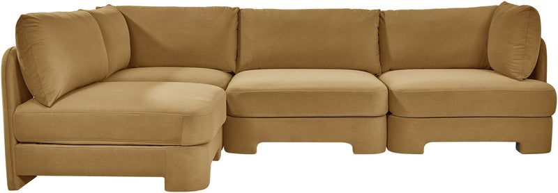 Tan velvet armless sectional sofa with wide seat cushions and rounded arms