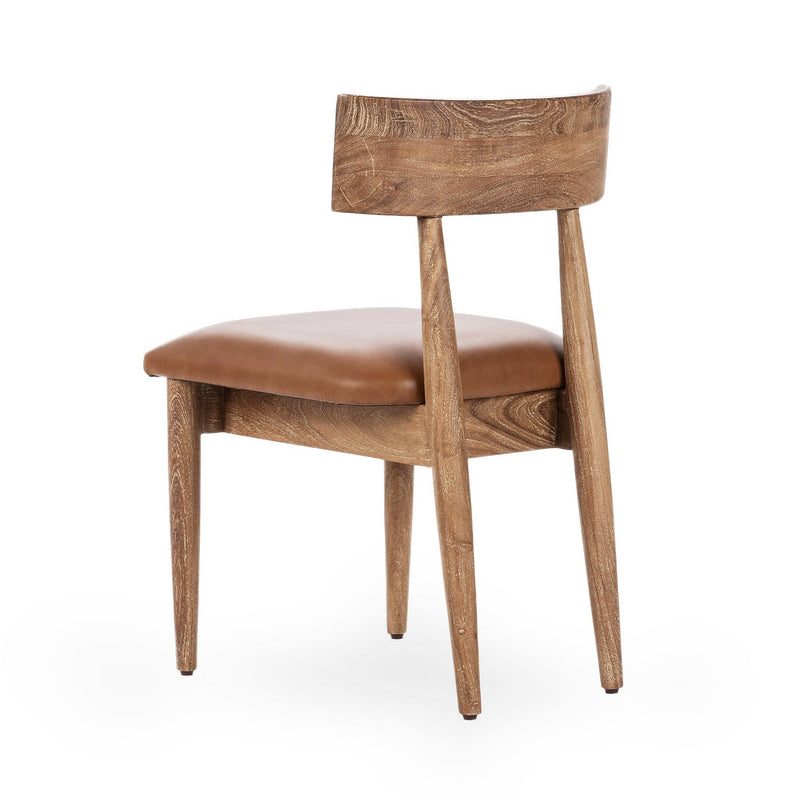 Leather dining chair with tan cushion, rounded arms, and tapered wooden legs