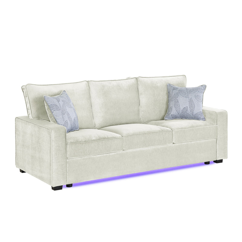 Light beige upholstered 3-seat sofa with squared arms, 2 throw pillows, and LED base light