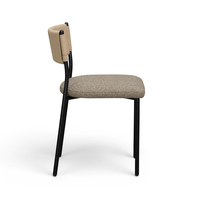 Boucle dining chair with beige fabric back, beige upholstered seat cushion, and black legs