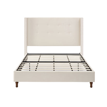 White upholstered bed frame with high button-tufted headboard and slat support