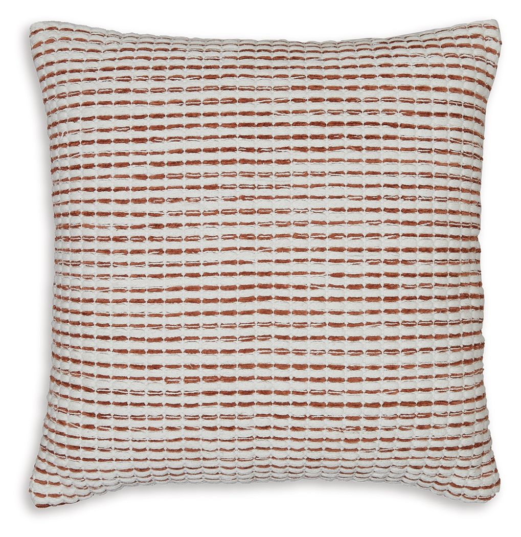 Rust-and-white textured throw pillow with corded edge, square shape
