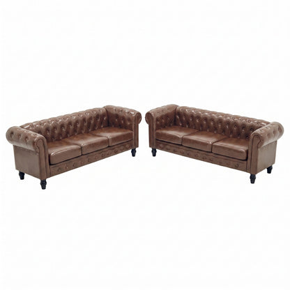 Dark brown two-piece sofa set with button-tufted backs and rolled arms