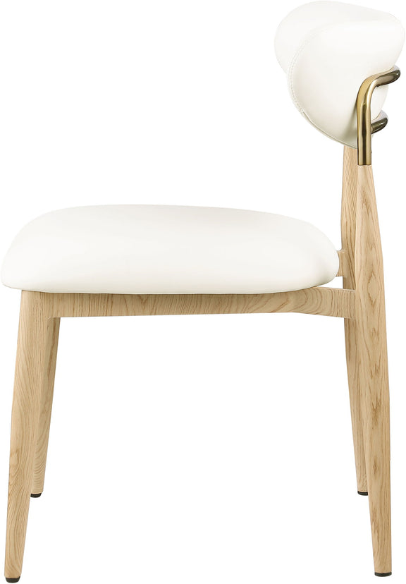 Vegan leather dining side chair with white cushioned seat and light wood legs