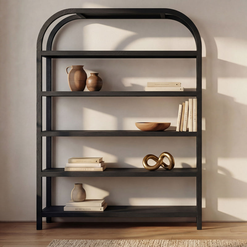 Black bookcase with arched top showing shelves with vases and stacked books