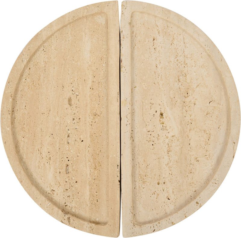 Beige travertine tray close-up with two semicircular halves and speckled texture.
