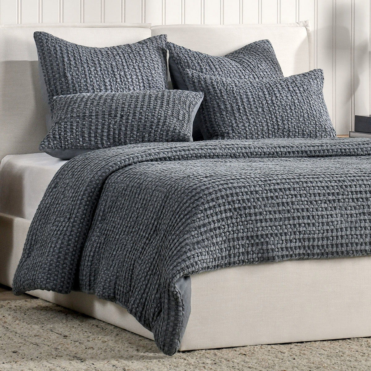 Colmar quilt set in marina blue with textured quilt and four square pillow shams