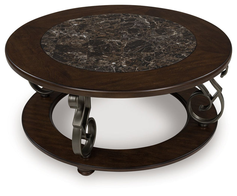 Dark brown round cocktail table with stone-look top, lower shelf, curved caster supports