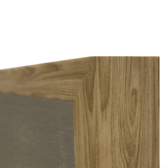 Beveled wooden frame edge in light brown with visible wood grain beside abstract gray canvas.