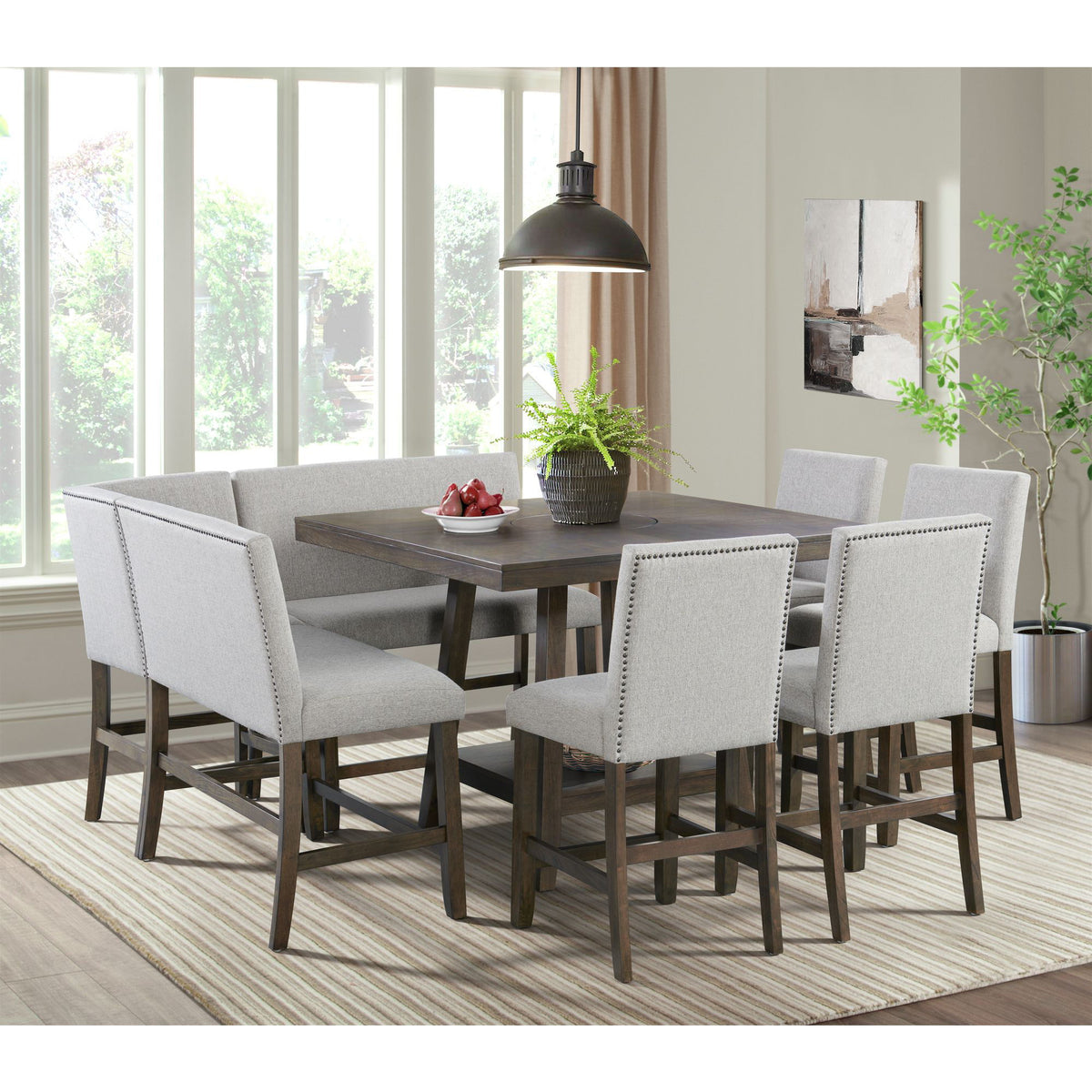 Square counter table with lazy susan, dark gray tabletop surrounded by four light gray chairs