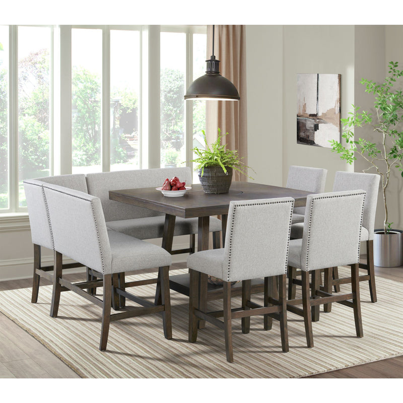 Square counter table with lazy susan, dark gray tabletop surrounded by four light gray chairs