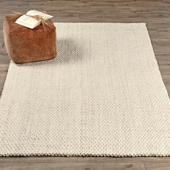 Ivory jute panama area rug, textured flatweave, laid flat