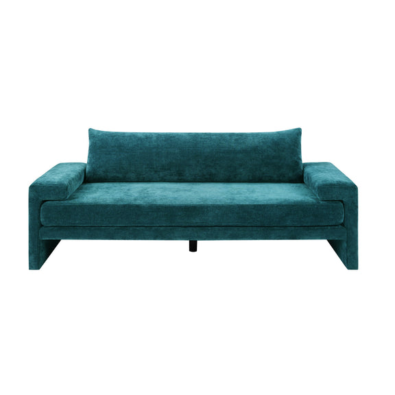 Upholstered 3-seater sofa with wide armrests, teal fabric, tufted seat look.