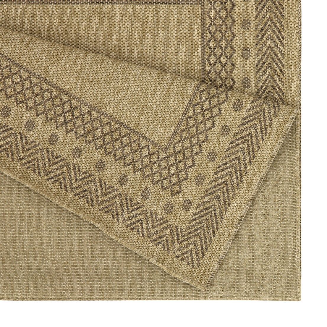 Light brown polypropylene area rug corner close-up with textured weave and geometric motif