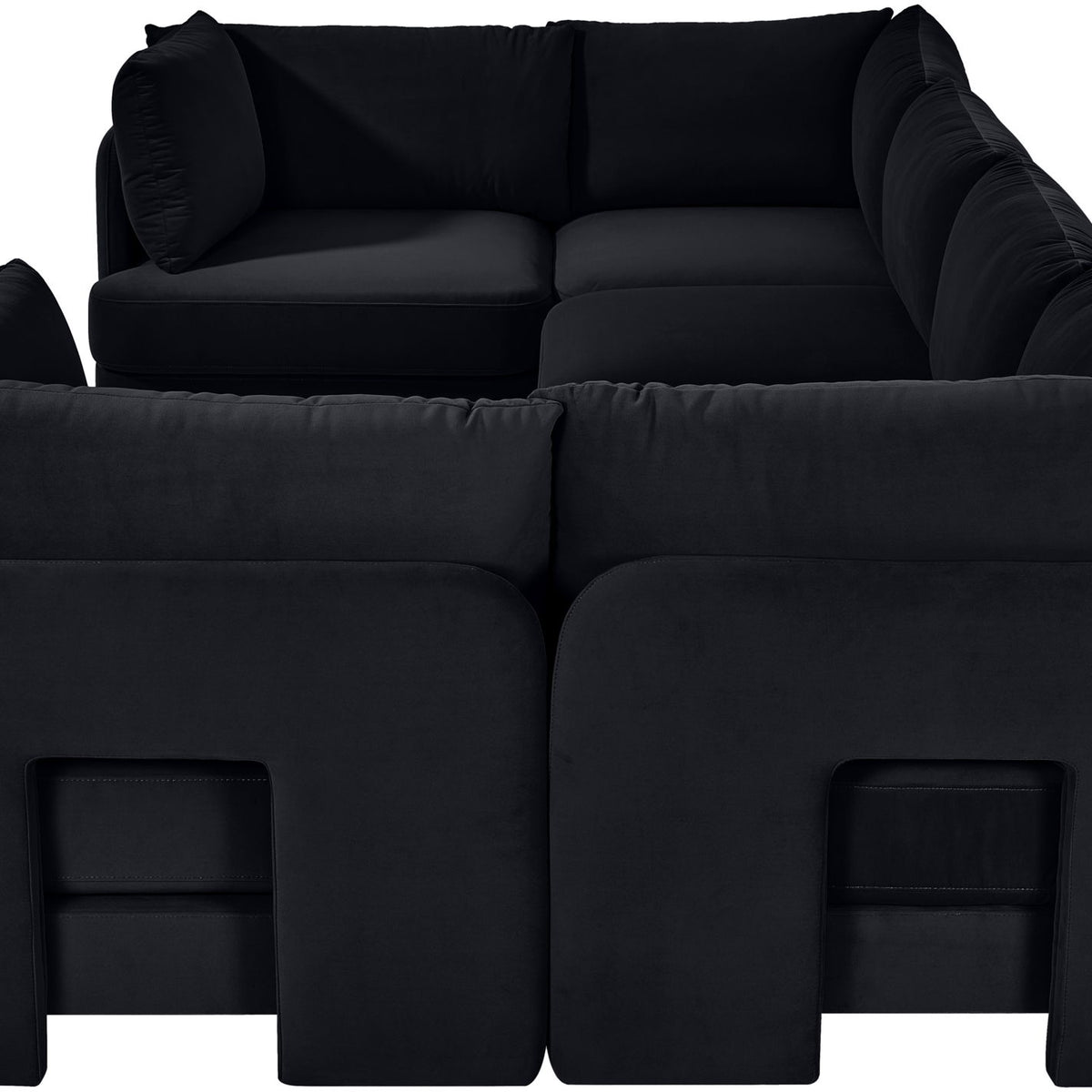 Black velvet U-shaped sectional sofa, 6-piece set with thick seat and back cushions.