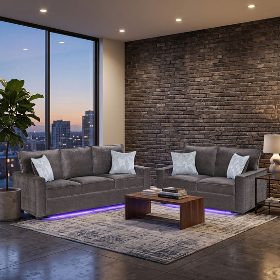 Gray upholstered seating set with two sofas and LED base light strip; 4 throw pillows
