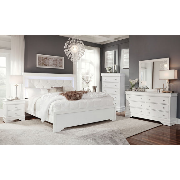 Bedroom set with white upholstered bed and matching dresser with multiple drawers