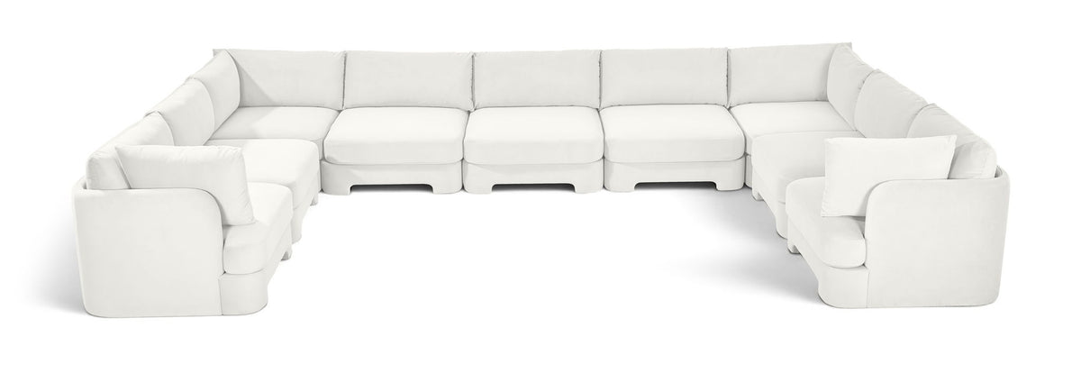 White velvet modular sectional, 9-piece set with chaise corner arms.