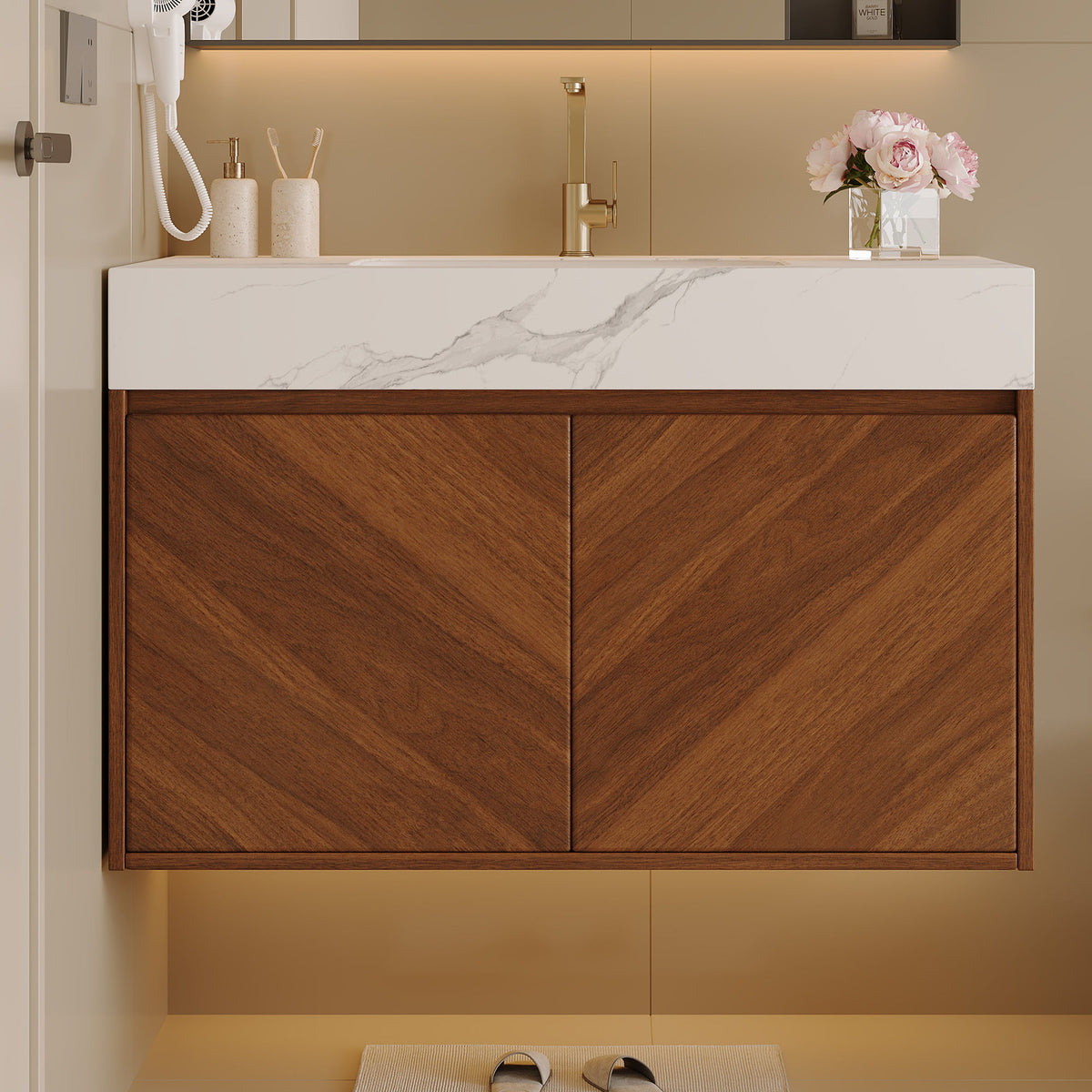 Front view of walnut vanity with two doors and a white marble-pattern sink