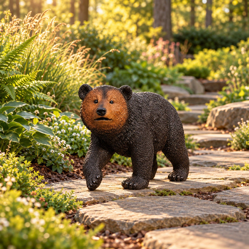 Textured bear garden statue shown from the front, with brown face and dark body