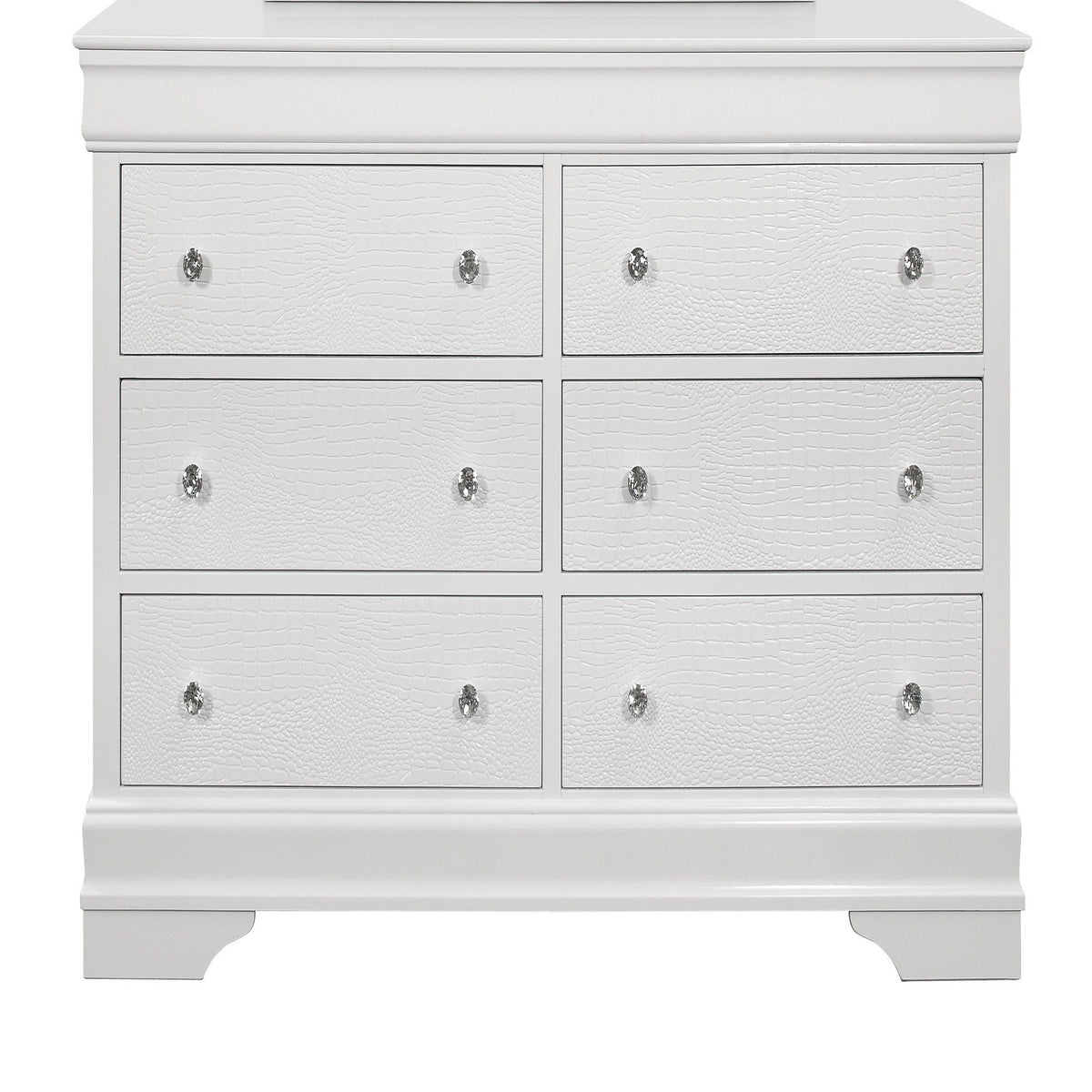 White chest of drawers with six drawer fronts and shiny metal knob pulls