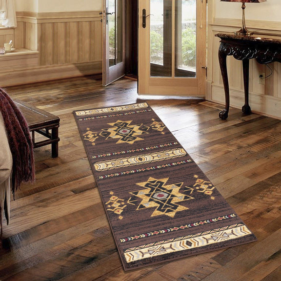 Southwest area rug runner, dark brown with gold star and diamond motifs, cream border