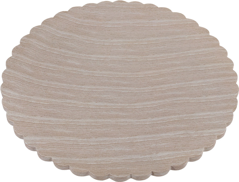 Light beige round tabletop with scalloped edge over a smooth pedestal base
