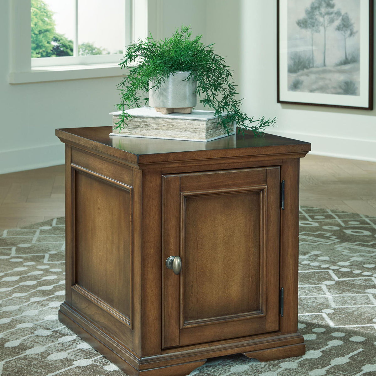 Dark brown wood nightstand-style table with one door and metal knob, square top