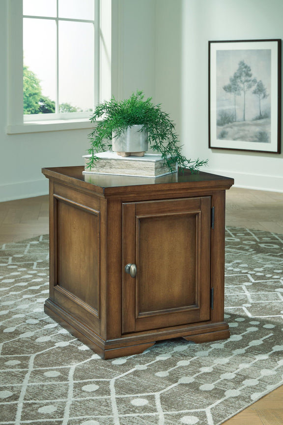 Dark brown wood nightstand-style table with one door and metal knob, square top